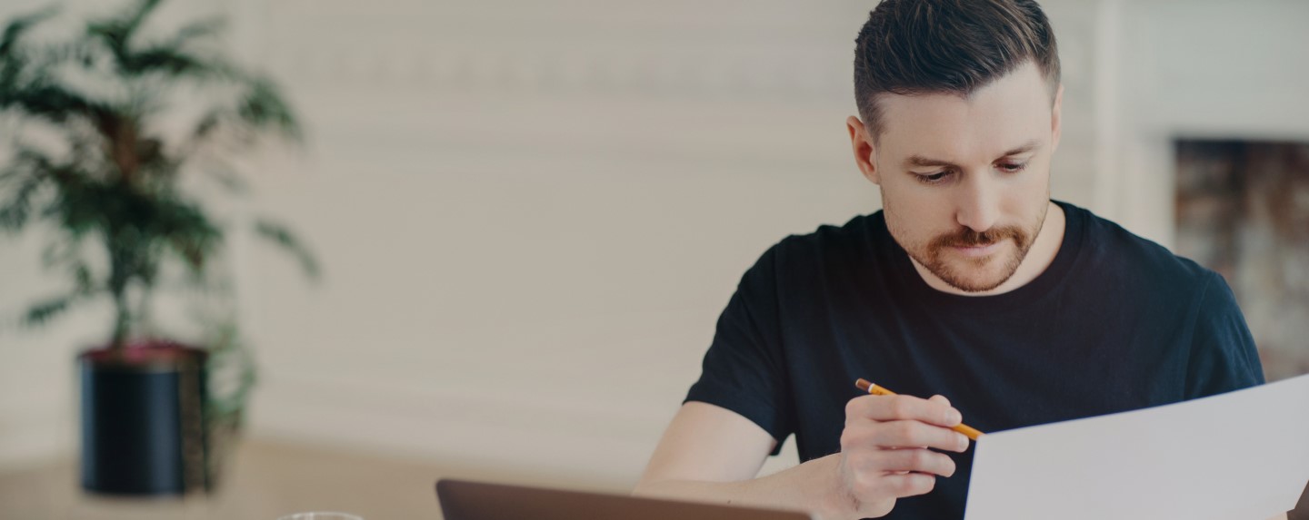 Business owner reviewing an insurance form.